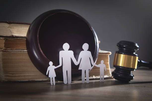Paper cut family, judge gavel and book. Family Law Paper cut family, judge gavel and book. Family Law Guardianship And Conservatorship stock pictures, royalty-free photos & images