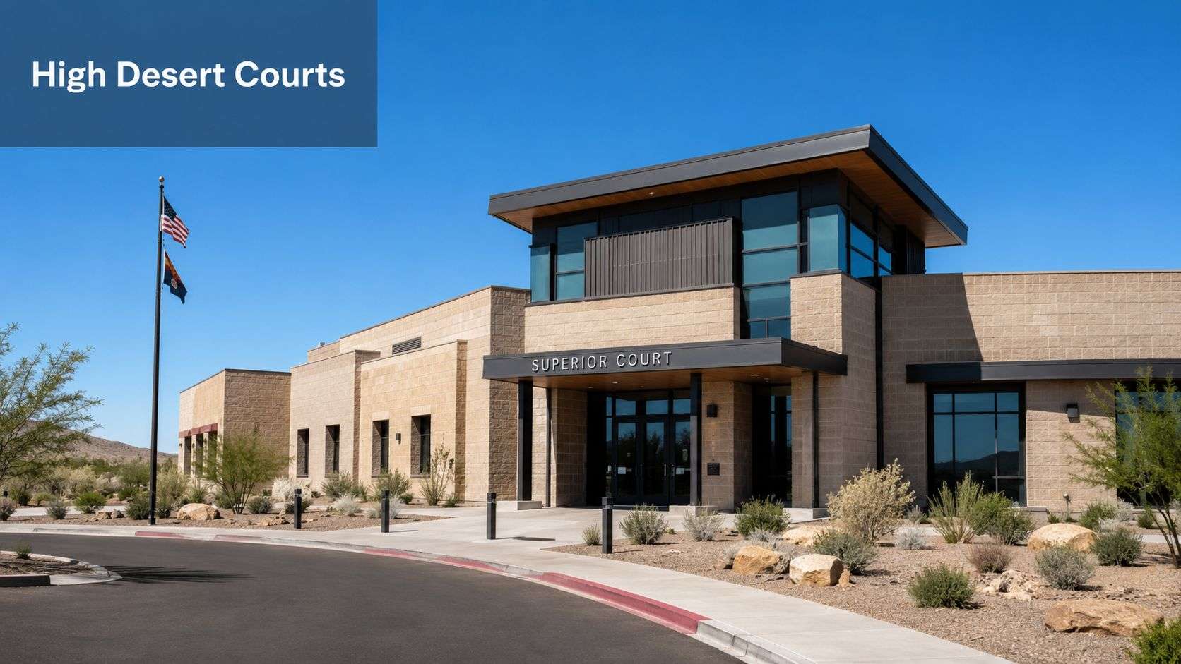 The modern exterior facade of the High Desert Superior Court building under a clear blue sky.
